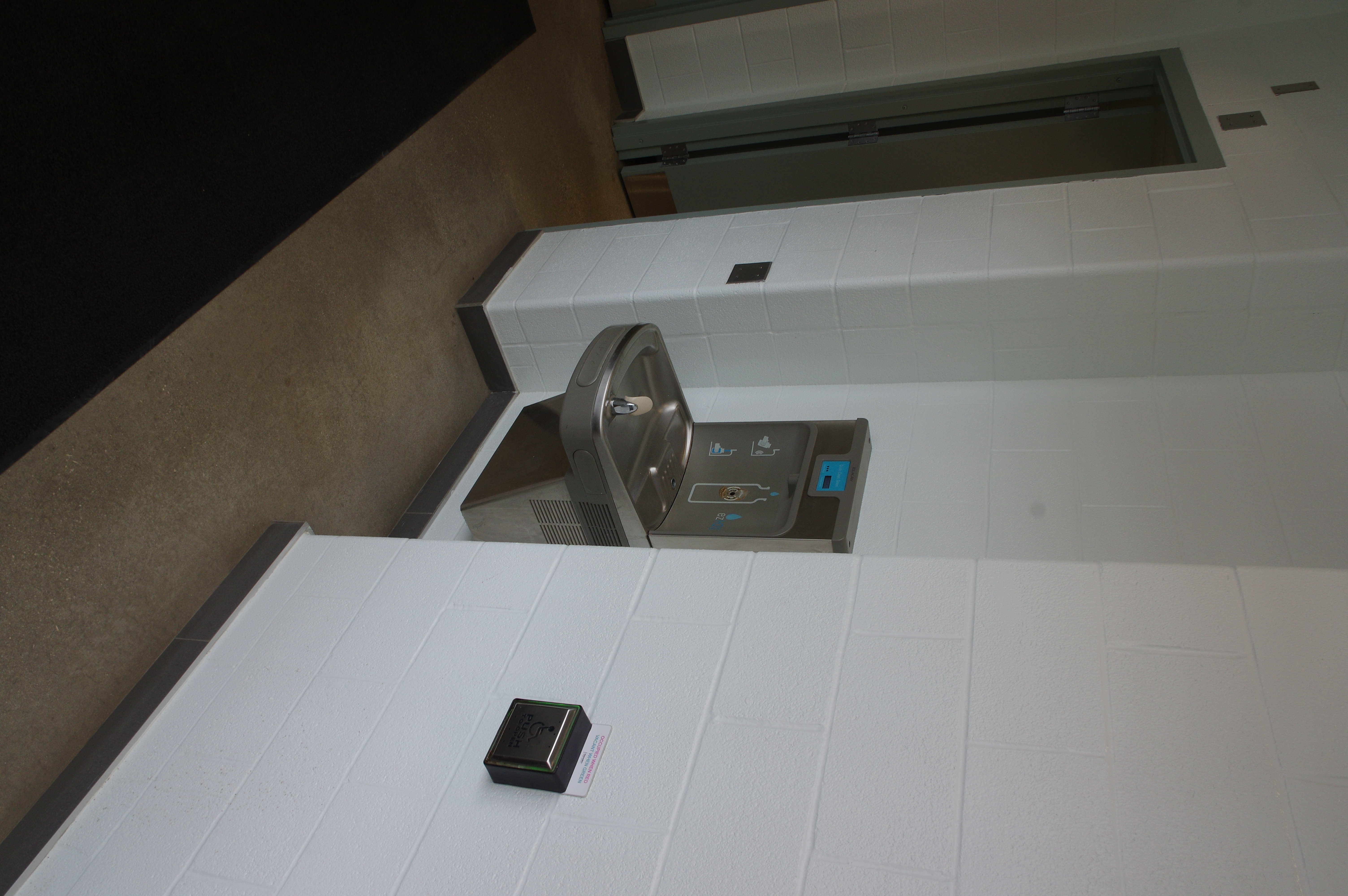 Located outside the public bathroom is the water refill station