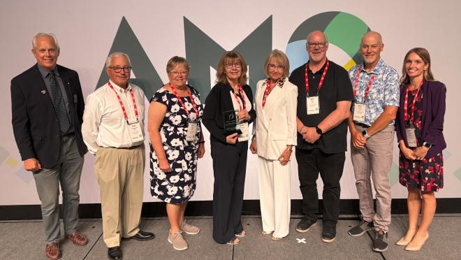Council at AMO receiving an award