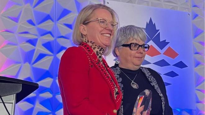 CAO Sonya Skinner receiving an award