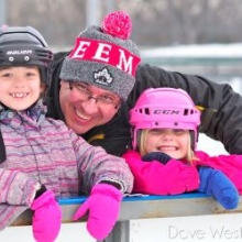 Father with kids skating