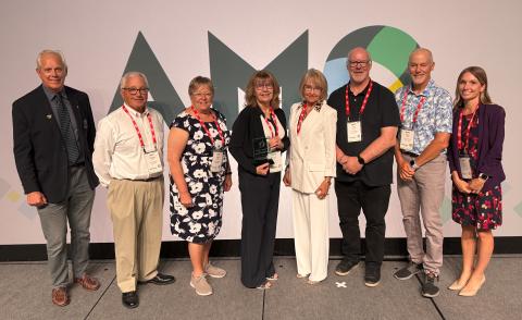 Council at AMO receiving an award