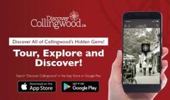 a hand holding a cell phone displaying the discover collingwood app in use