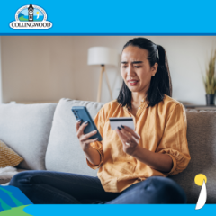 photo of a woman with a concerned look on her face looking at her mobile device and credit card