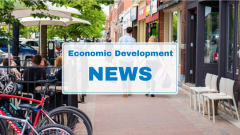 Couple walking down Hurontario Street with shopping bags. Text: Economic Development News