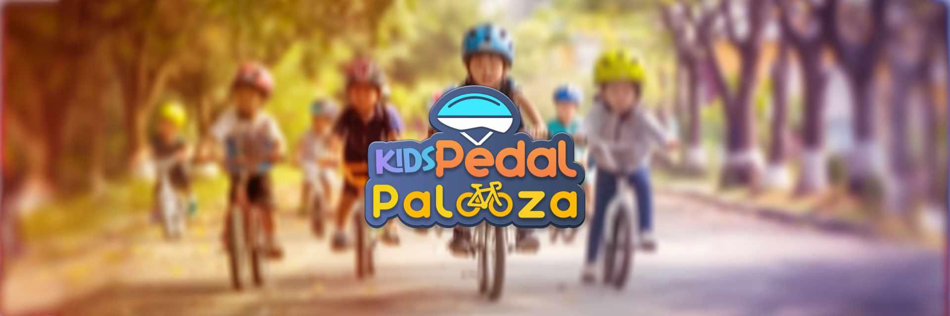Image capturing children riding bikes with helmets on.