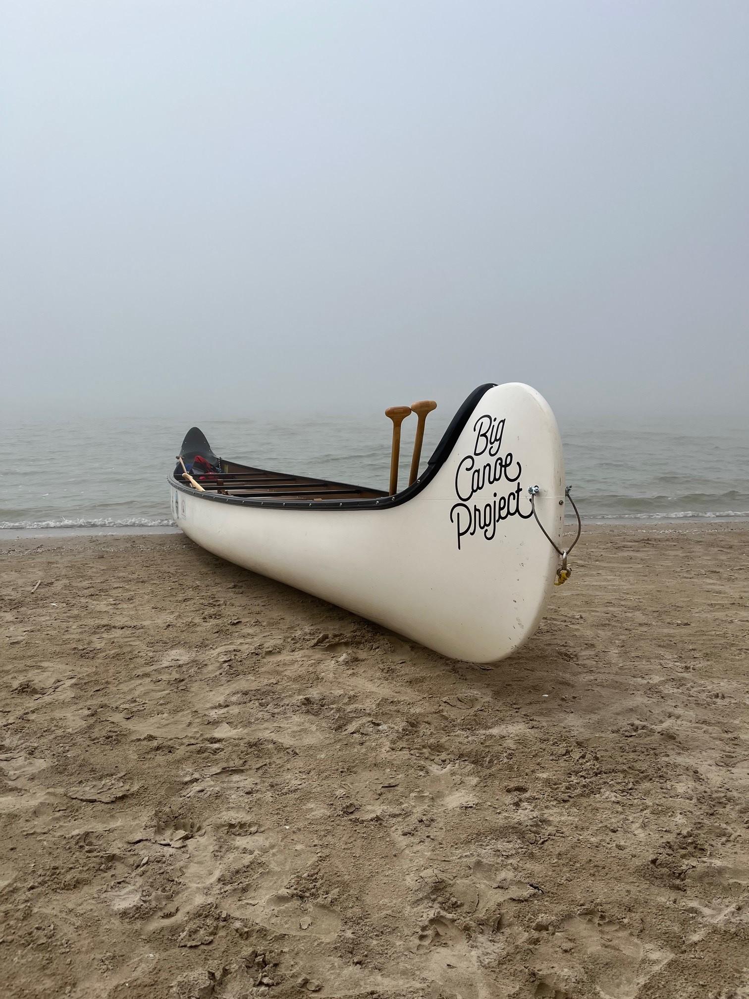 Large canoe with two paddles