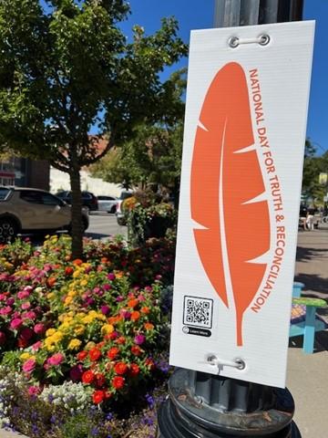 Orange Feather Sign